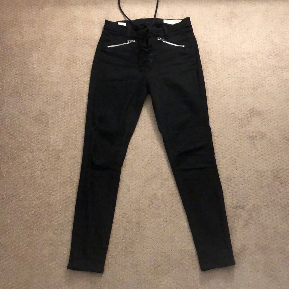 Black pants with zippers and tie up the front